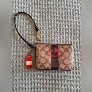 Coach wristlet from heritage stripe collection